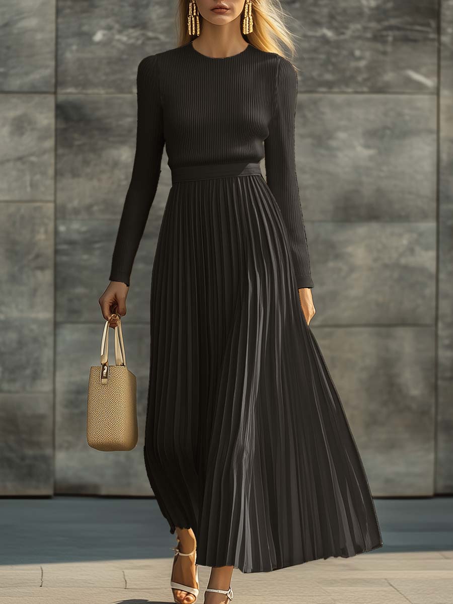 Charlotte black ribbed knit top and pleated skirt set, walking