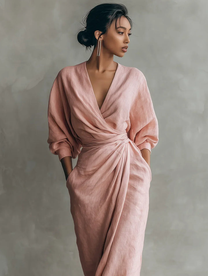 Ottavia wrap maxi dress in blush pink, detail of draped waist and V-neckline