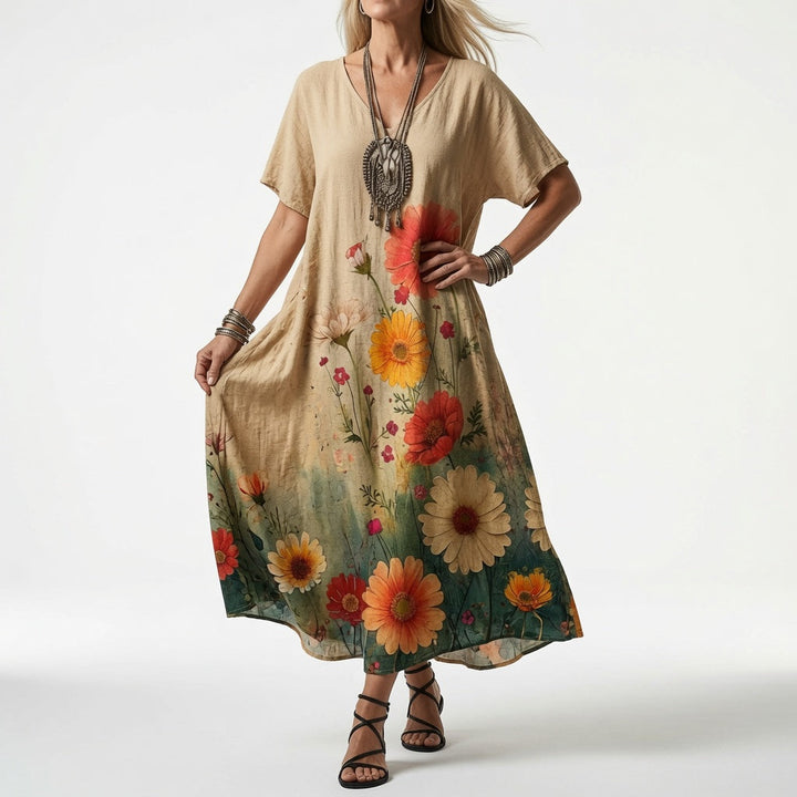 Elisoria flowing V-neck midi dress in beige with poppy and sunflower print at the hem