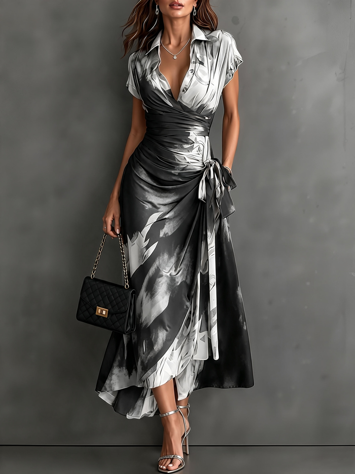 Saffron abstract print collared wrap maxi dress in white and black, with tie waist and ruffled high-low hem