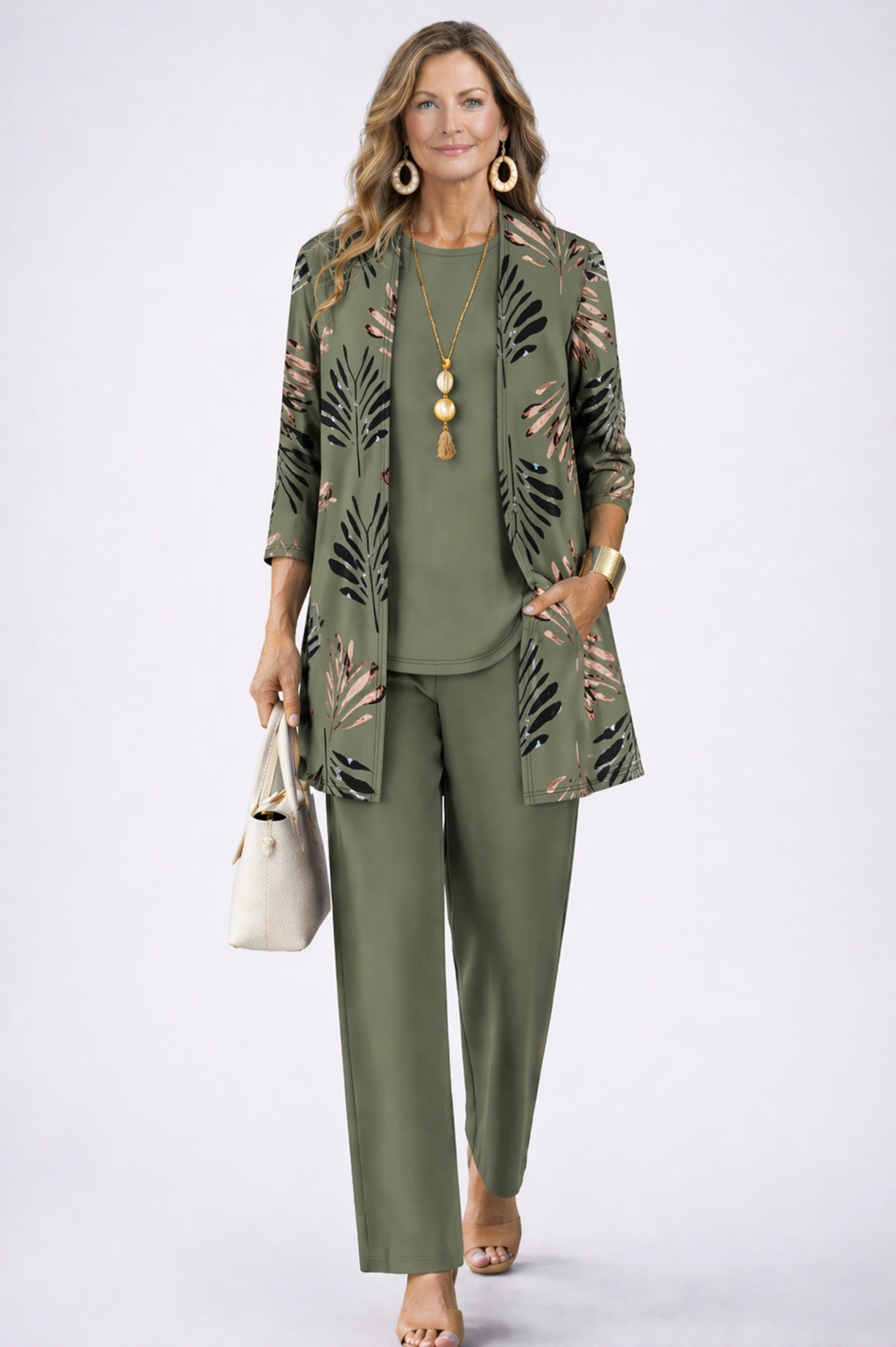 Augusta green three-piece set: sage green open-front cardigan with pink and black leaf print, round-neck top and wide-leg trousers