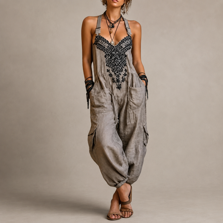 Willow grey bohemian harem jumpsuit with embroidered V-neck bodice, adjustable straps and cuffed ankles