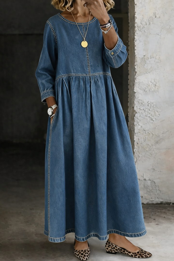 Zephyrelle vintage denim maxi dress in classic blue, with long sleeves and side pockets