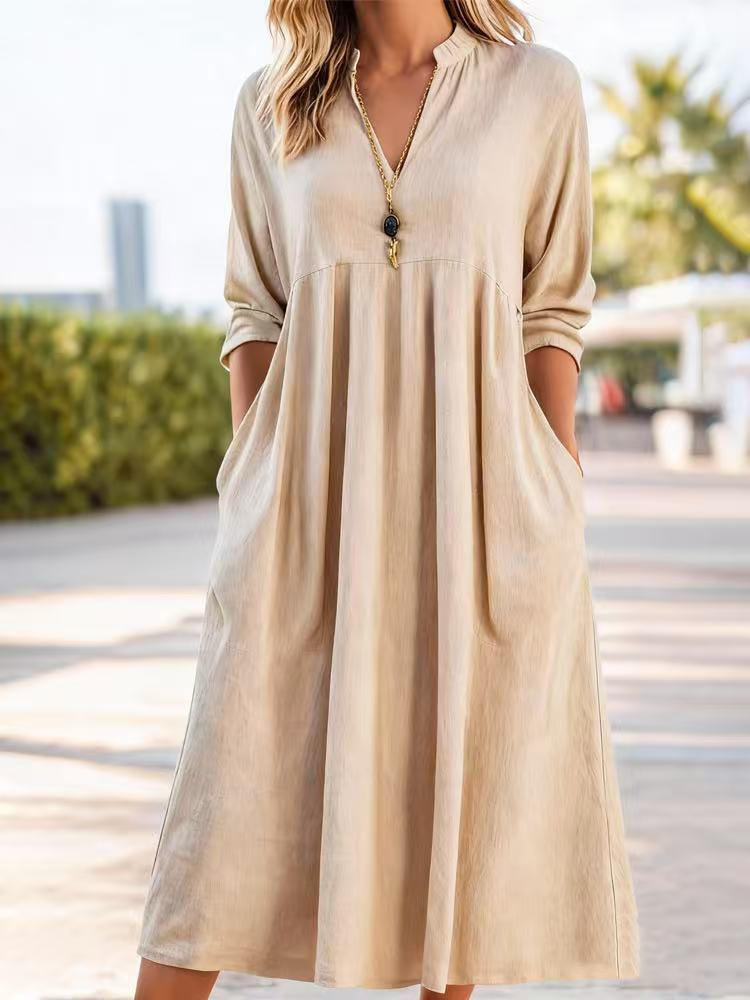 Esme cotton A-line midi dress in warm khaki, with mid-forearm sleeves and side pockets