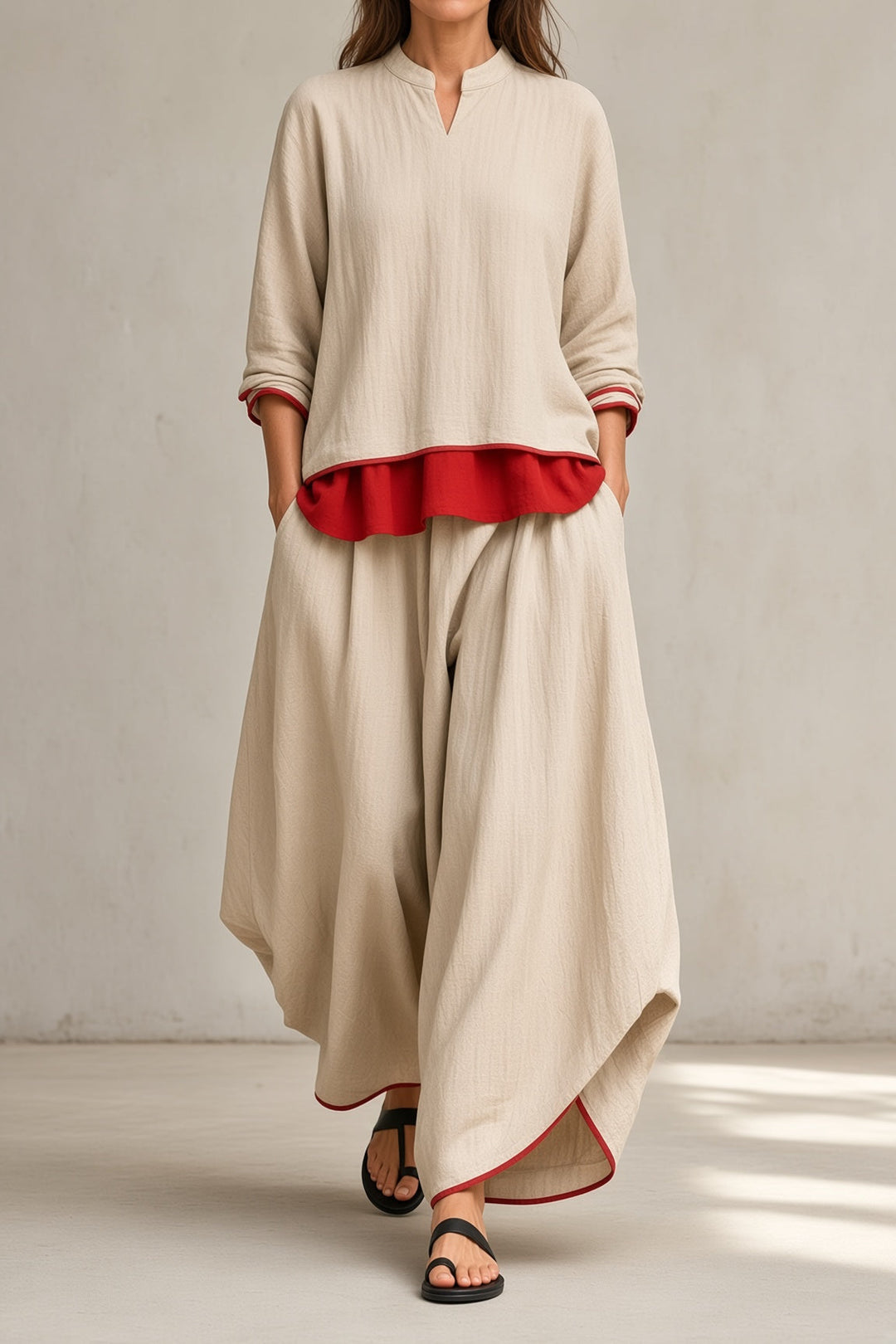 Tamsin two-piece set in beige with red layered hem and contrast-trim wide-leg pants